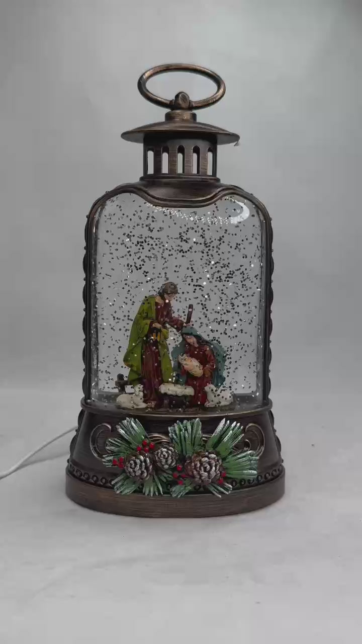 Load video: 2pc/Box Lighted Nativity Water Lantern: Holy Family Glitter Snow Globe