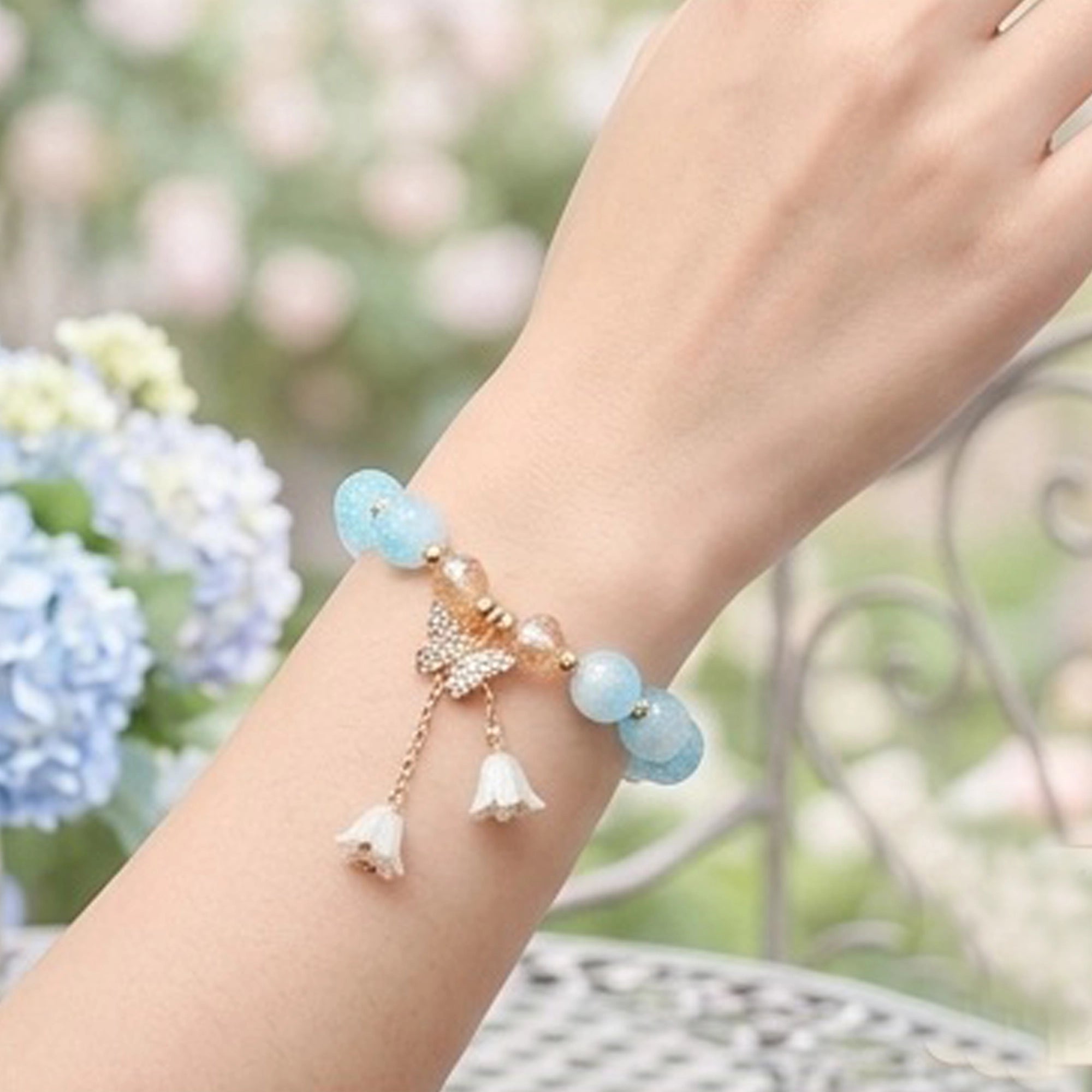Elegant Butterfly Charm Beaded Bracelet with Rhinestones & Floral Dangles (ABR1426)