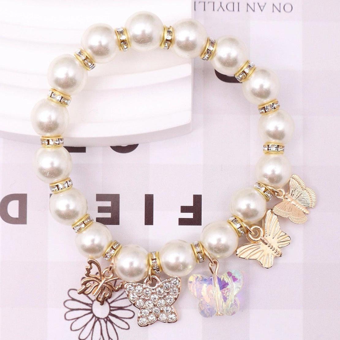 Elegant Butterfly Charm Pearl Bracelet (ABR1429)