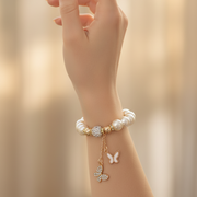 Elegant Faux Pearl Charm Bracelet with Crystal Butterfly Pendants (ABR1431)