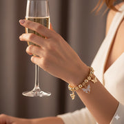 Delicate Dazzle: Flower & Butterfly Stretch Bracelet