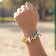 Kids' Charm Bracelet – Gold & Silver Tone Coil Stretch Bracelet with Musical & Floral Charms (CB2899)