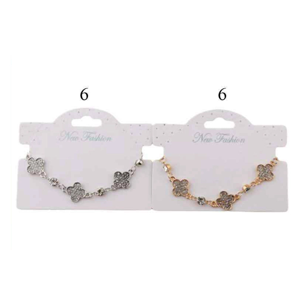 Dazzling Luck: The Gold-Tone Clover Rhinestone Bracelet