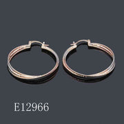 E12966 - Tri-Color Gold Plated Twisted Hoop Earrings for Women – Diamond-Cut Textured Crossover Creoles
