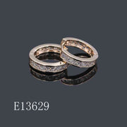 E13629 - Gold Plated Channel-Set Cubic Zirconia Huggie Hoop Earrings for Women
