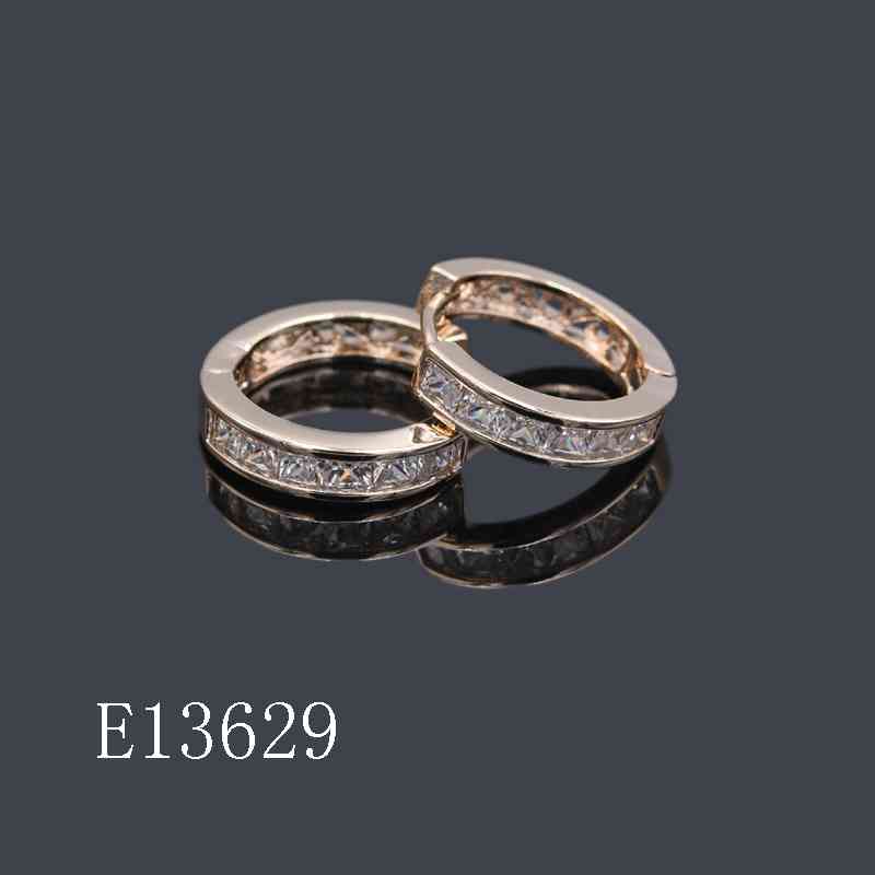 E13629 - Gold Plated Channel-Set Cubic Zirconia Huggie Hoop Earrings for Women