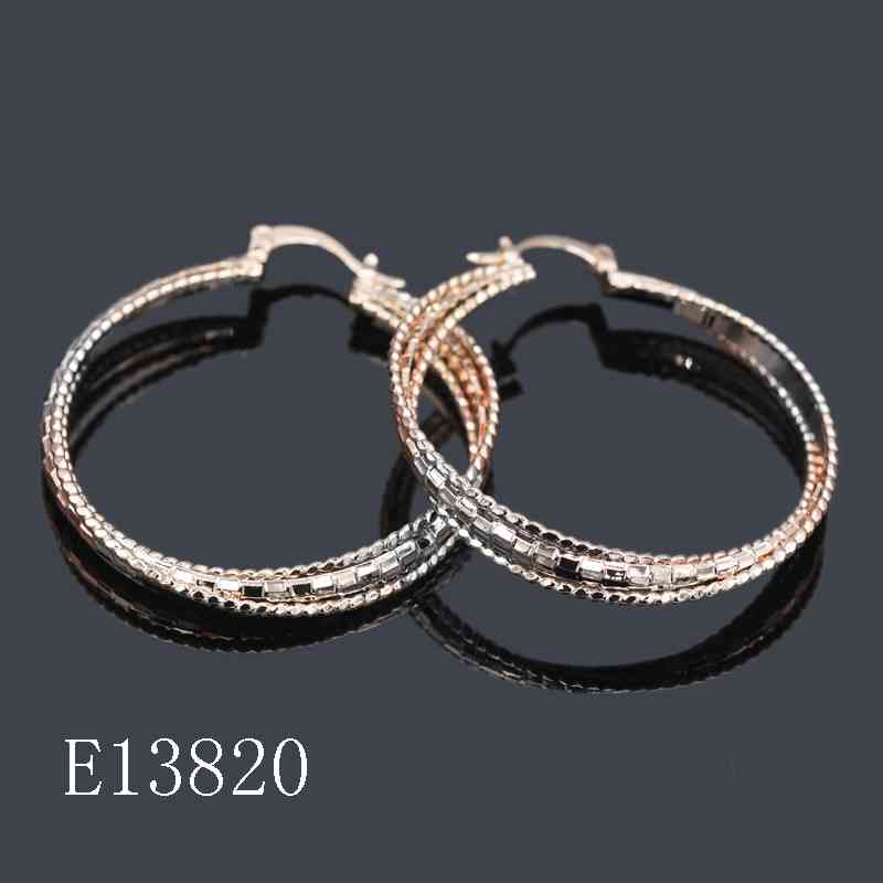 E13820 - Elegant Tri-Tone Gold Plated Hoop Earrings – Diamond-Cut Textured Twisted Crossover Hoops for Women