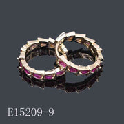 E15209-9 - Gold Plated Ruby Pink Baguette Cut Zirconia Huggie Hoop Earrings