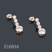 E16934 - Gold Plated Graduated Cubic Zirconia Drop Earrings | Bezel Set CZ Linear Drop Earrings | Bridal & Evening Jewelry