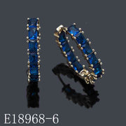 E18968-6 - 18K Gold Plated Emerald Cut Sapphire Blue Cubic Zirconia Huggie Hoop Earrings
