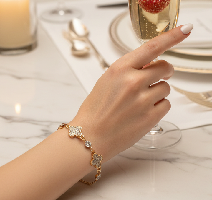 Dazzling Luck: The Gold-Tone Clover Rhinestone Bracelet