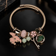 HB00003 - Gold Plated Charm Bracelet for Women – 100% Brass Twisted Bangle with Pink & Green Enamel Charms
