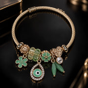 HB00009 - 18K Gold Plated Green Clover & Evil Eye Charm Bracelet – 100% Brass