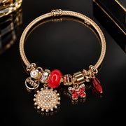 HB00014 - Gold Plated Charm Bracelet with Red Enamel, Pearl & Crystal Heart – 100% Brass