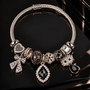 HB00022 - Silver-Tone Gold Plated Charm Bracelet with Crystal Accents & Black Gemstone – 100% Brass
