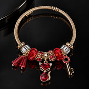 HB00029 - Gold Plated Red Crystal Charm Bracelet with Cat Pendant & Key – 100% Brass