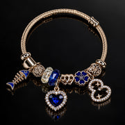 HB00038 - Gold Plated Charm Bracelet – 100% Brass Blue Heart & Floral Charms