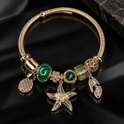 HB00077 - Gold Tone Tropical Starfish Bangle Charm Bracelet with Emerald Crystals & Pineapple Charm