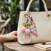 Handmade Crochet Tulip Keychain with Faux Pearl Wristlet Strap – Cute Floral Knit Bag Charm, Aesthetic Backpack Pendant (KC-73450M)