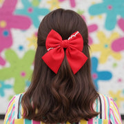 Dazzling Statement: The Must-Have Big Bow Hair Clip!
