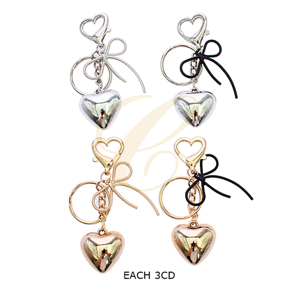 The Puffy Heart Keychain: Chic Gold & Ribbon Bag Charm