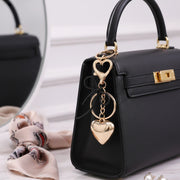 The Puffy Heart Keychain: Chic Gold & Ribbon Bag Charm