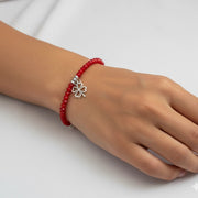 Red String Faceted Bead & Assorted Charm Bracelet Set