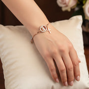 Gold-Tone Adjustable Marian Bracelet with Cross Charm