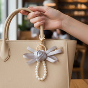 Elegant Rose Ribbon Keychain with Pearl Wristlet | 16cm Floral Bow Knot Bag Charm & Key Ring, 6 Color Assortment, 12pc Wholesale Pack (YNV-1725E)