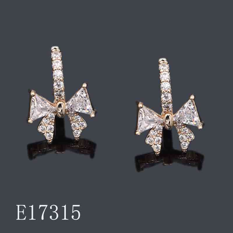 E17315 - Gold Plated Cubic Zirconia Bow Huggie Hoop Earrings | Sparkling Ribbon Knot Earrings for Women