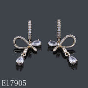 E17905 - Gold Plated Ribbon Bow Dangle Earrings with Teardrop Cubic Zirconia | Coquette Dainty Huggie Hoops