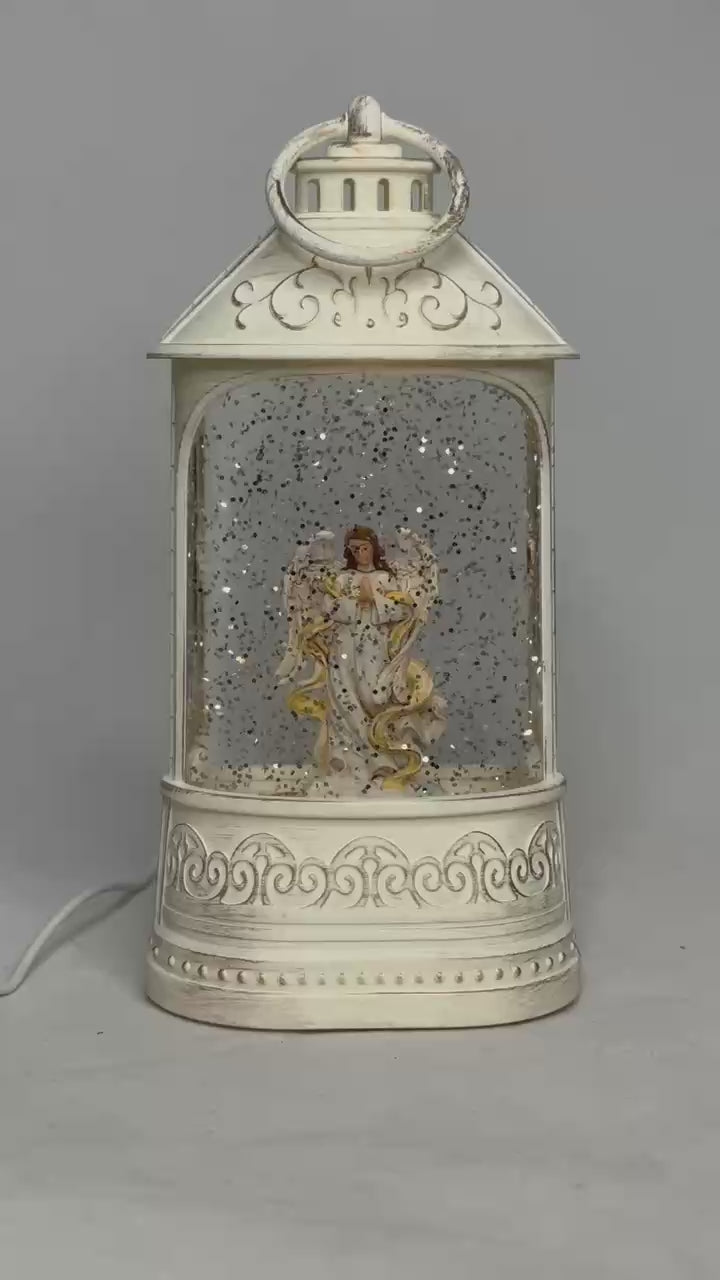 Load video: 2pc/Box Illuminate Your Holidays! Vintage-Style Angel Lighted Water Lantern with Swirling Glitter
